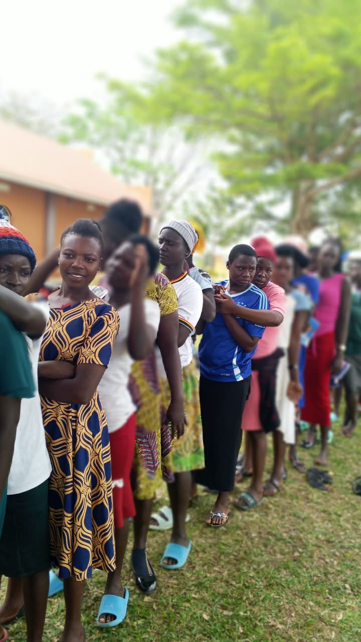 Long queue of young people waiting for health services