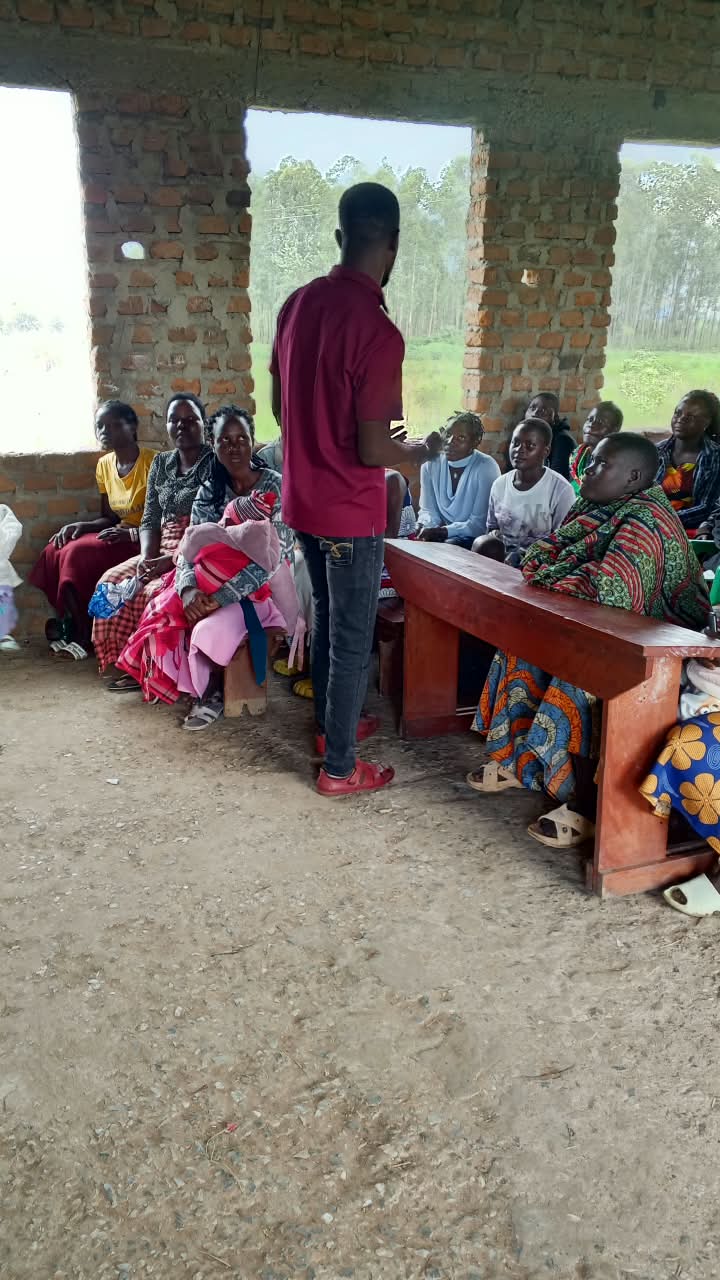 Young people seated at an outdoor community session