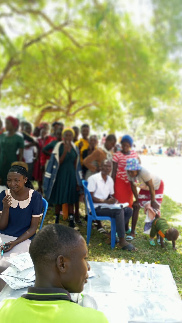Health worker at testing station